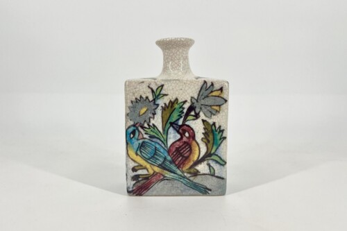 White ceramic vase with a crackled glaze, tall narrow neck, adorned with a colorful bird-and-flower motif.