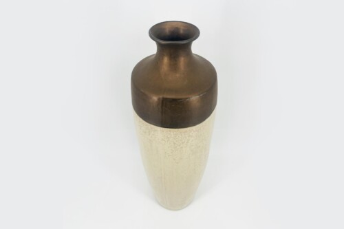 Ceramic vase with a dark brown glaze on the neck and a speckled beige body, photographed from above, tall and slender.