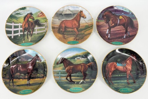 Six decorative round plates each featuring a painted racehorse in a different setting, with horse names on turquoise labels (e.g., War Admiral, Whirlaway, Citation).