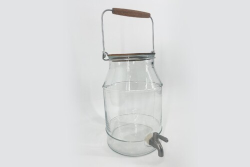 Clear glass dispenser bottle with a metal swing-top lid and a small faucet at the bottom for dispensing liquids.