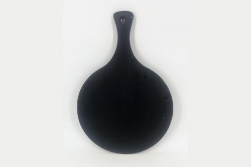 Black silicone spatula with a wide circular head and a short neck ending in a hanging hole.