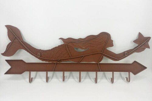 Brown metal mermaid-shaped wall coat rack with six hooks along the base and a decorative tail motif.