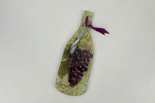 Decorative wine bottle-shaped board with a grape cluster design and a silver corkscrew tied with a purple ribbon at the neck