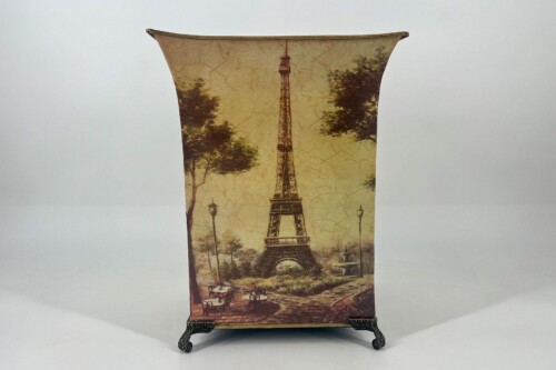 Decorative vase with a vintage Paris scene featuring the Eiffel Tower and street lamps on an ornate metal stand.