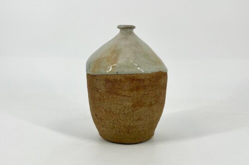 Brown, textured ceramic bottle with a bulbous lower half and a light gray glazed, narrow neck.