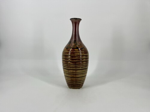 Brown glazed ceramic vase with a narrow neck and tan horizontal stripes at the base, centered on a white background.
