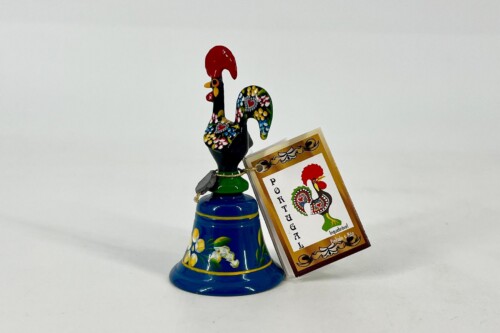 Colorful ceramic rooster figurine with a hanging Portugal tag attached to its neck