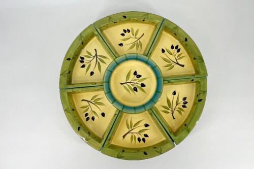 Circular ceramic wall plate, eight yellow wedges with olive branch motifs in green rimmed segments.