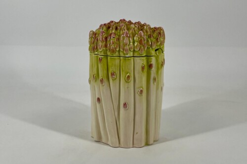 Glazed ceramic corn cob sculpture with green kernels on a pale beige stalk. (Decorative piece)