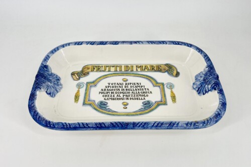 Ceramic rectangular serving tray with a blue, scrolled edge and a framed Italian seafood menu, labeled Frutti di Mare and listing dishes below.