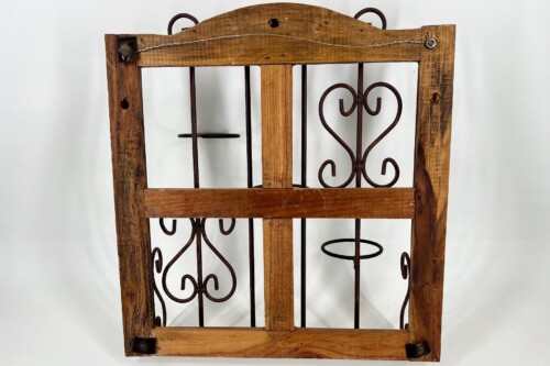 Vintage wooden frame with decorative wrought-iron scrollwork, featuring a heart-shaped design on the right panel and a curved top arch.