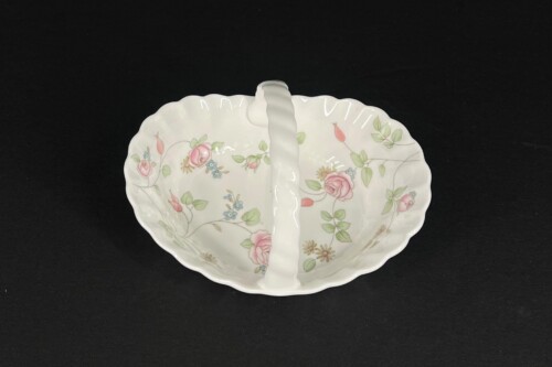 White porcelain divided serving dish with pink rose and leaf pattern, featuring a central raised divider across the bowl's interior